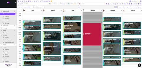 Klickbook daily spa scheduler showing appointments across seven staff calendars